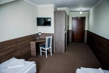 Фото номера Двухместный номер с 2 отдельными кроватями Мотели Motel Domowy Gościniec г. Ломжа 7