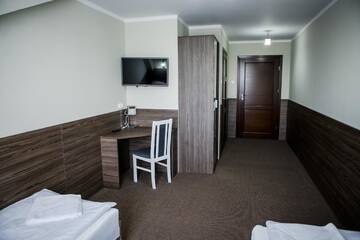 Фото номера Двухместный номер с 2 отдельными кроватями Мотели Motel Domowy Gościniec г. Ломжа 3
