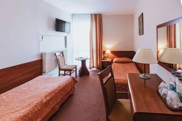 Фото номера Стандартный двухместный номер с 2 отдельными кроватями Отель Hotel Gromada Łomża г. Ломжа 4