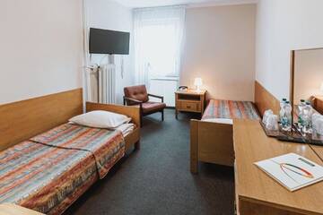 Фото номера Двухместный номер эконом-класса с 2 отдельными кроватями Отель Hotel Gromada Łomża г. Ломжа 5