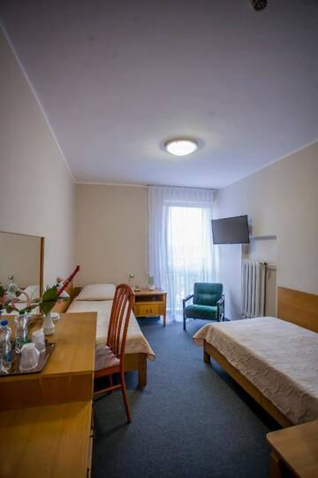Фото номера Двухместный номер эконом-класса с 2 отдельными кроватями Отель Hotel Gromada Łomża г. Ломжа 8
